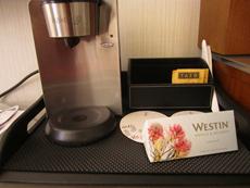 a coffee maker and cd case