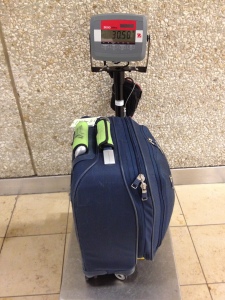 Luggage on airport scale