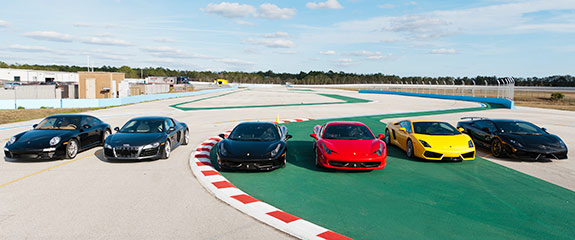 a group of cars on a race track