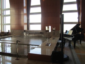 a piano next to a pool