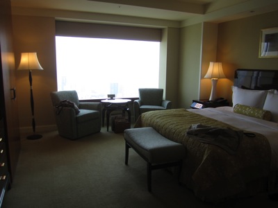 a hotel room with a large window