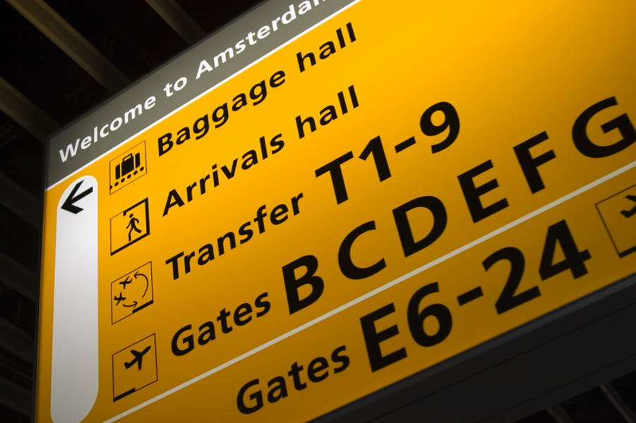 Low angle view of a sign board at an airport